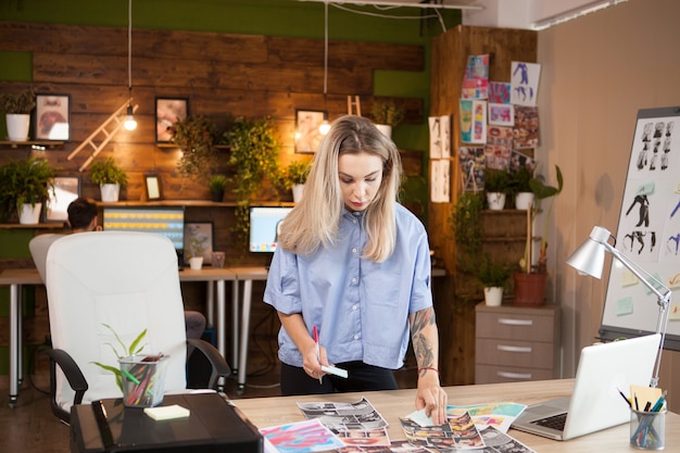 Young Fashion Designer in Creative Office Seeking Inspiration