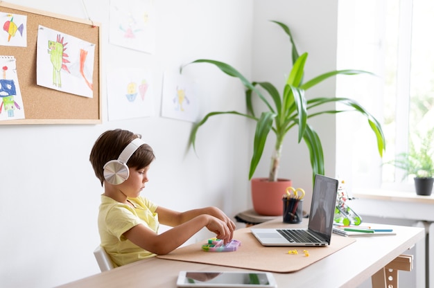 Medium Shot Boy Wearing Headphones Indoors