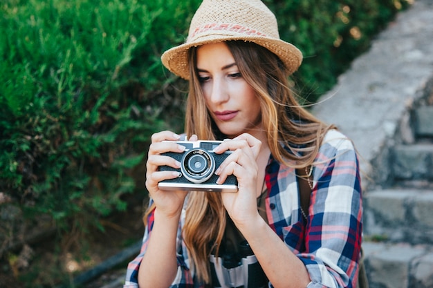 Traveler with camera in the park – Free Stock Photo for Download