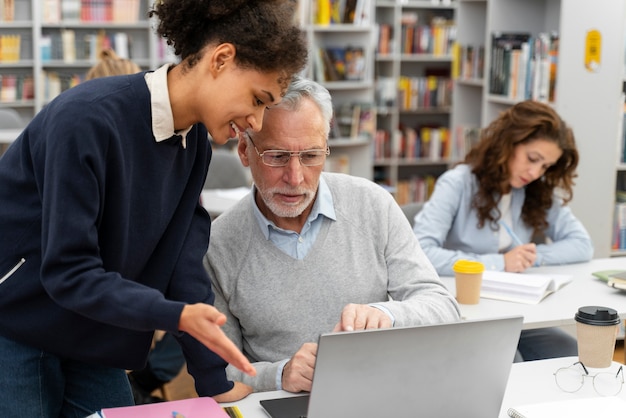 Close up people studying with laptop – Free Stock Photo for Download