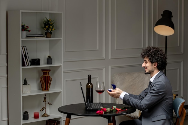 Handsome Guy in Suit with Wine on Virtual Date