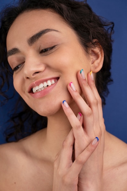 Close up smiley woman with beautiful nails