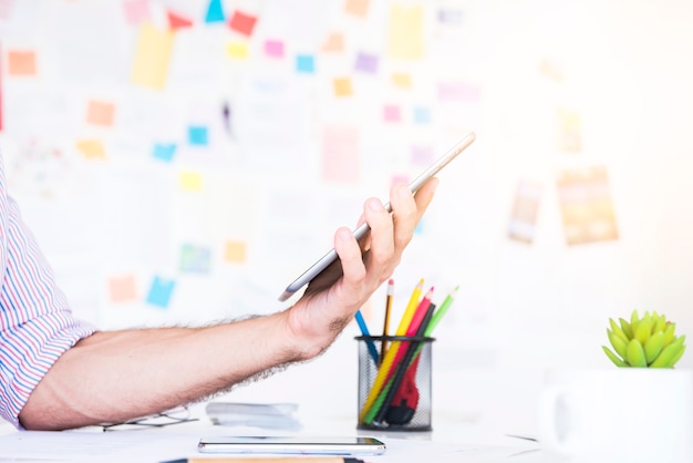 Man working with a tablet in an office