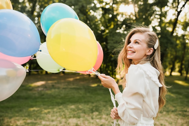 Close-up Smiley Birthday Girl with Balloons – Free Stock Photo Download