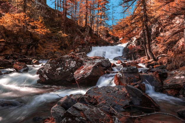 Autumn Landscape and Waterfall in a Forest