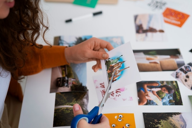 Woman creating inspiring vision board side view – Free Stock Photo Download