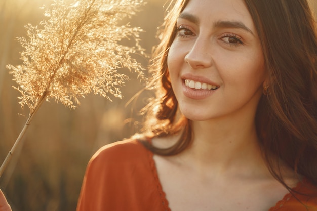 Stylish woman spending time in a summer field – Free Stock Photo for Download