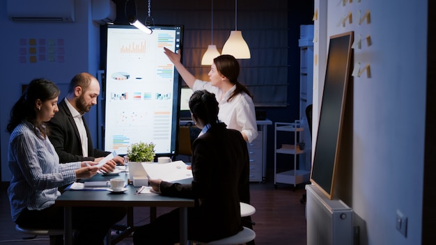 Upset Businesswoman Entering Office Meeting Room Late at Night