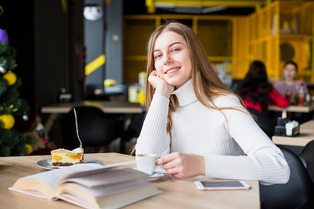 Portrait of modern woman in coffee shop