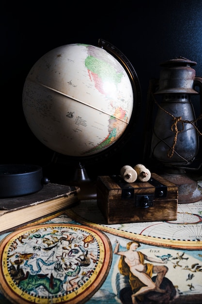 Close-up of Historical Map with Globe and Lantern