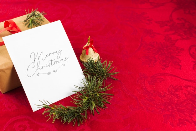 Christmas Greeting Card on Red Table