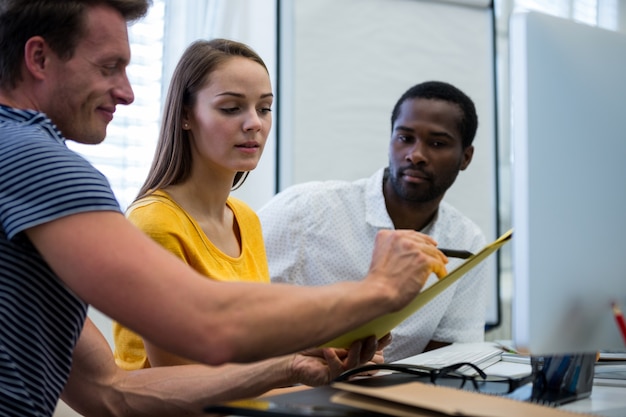 Serious workers comparing results – Free Stock Photo Download