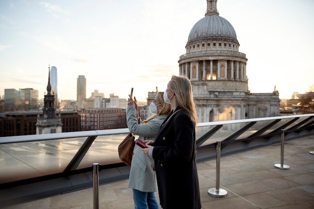 Tourists Visiting City and Wearing Travel Mask