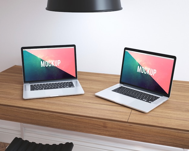 Laptops on wooden desktop mock up with free stock photos for download