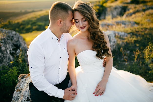 Beautiful couple posing on their wedding day