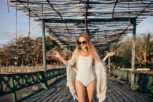 Adorable European Woman Dancing with Smile on Nature