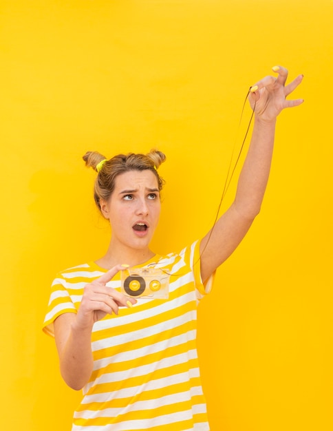 Woman Holding Old Cassette – Free Stock Photo Download