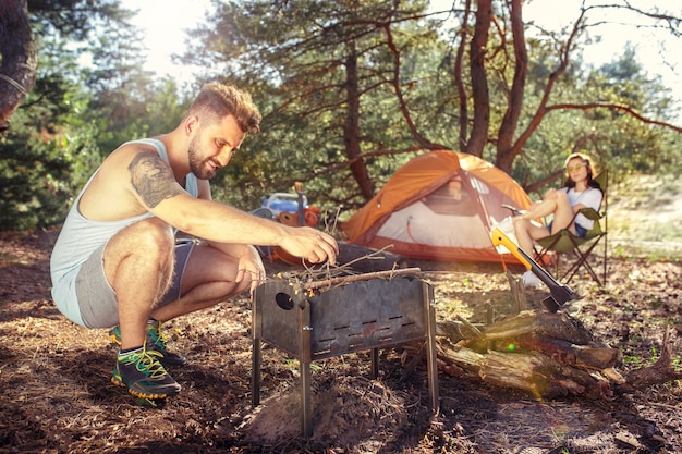 Men and Women Group Party and Camping in the Forest