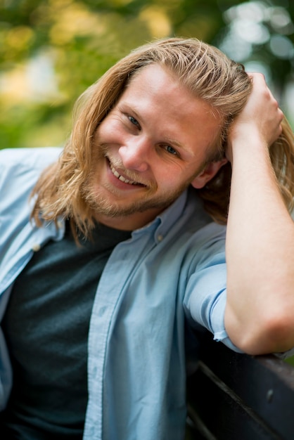 Front view of smiley man posing outdoors – Free Stock Photo