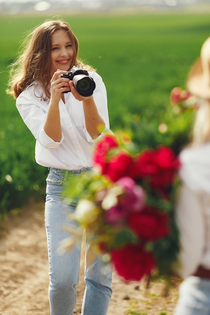 Photographer makes a photoshoot for woman