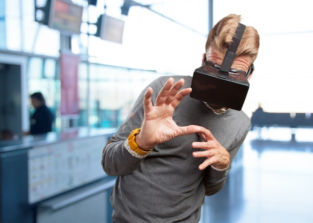 Blond Man with Virtual Glasses Showing Surprised Expression