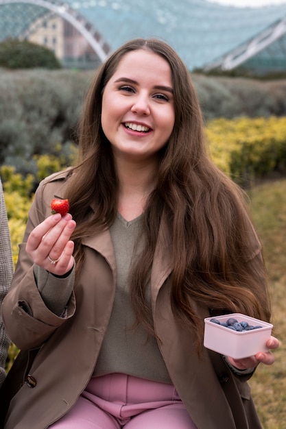 Youth enjoying fresh berries outdoors