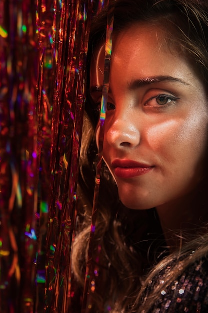 Woman with brown eyes and long hair close-up