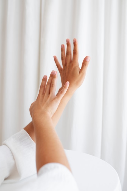 Portrait with Hands Posed Together