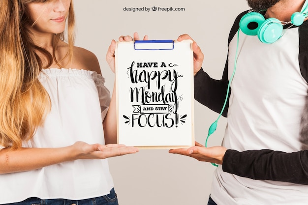 PSD Templates: Couple showing clipboard – Free Download