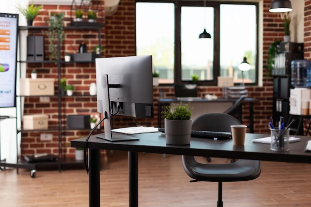 Nobody in business office with computer and instruments on desk