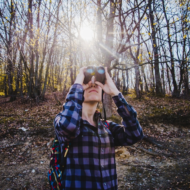 Concentrated Rambler Using Her Binoculars – Free Stock Photo Download