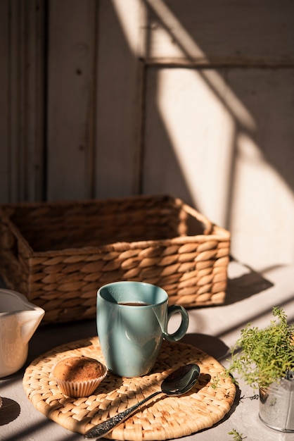 Front View Cup of Coffee with a Muffin