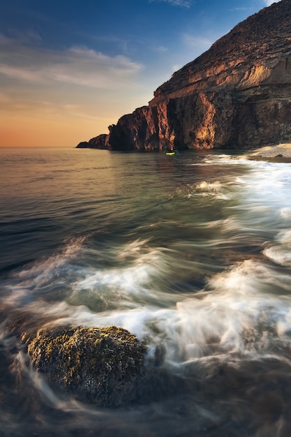 Breathtaking Seascape and Rock Formation at Dramatic Sunset – Free Stock Photo Download