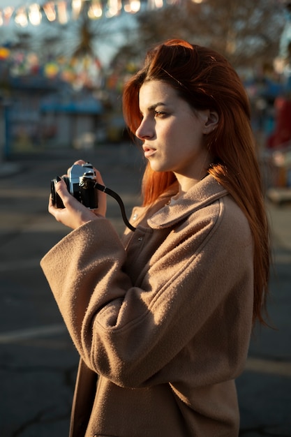 Young woman taking photos