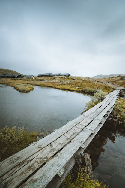 Vertical Wooden Dock over Lake in Finse, Norway