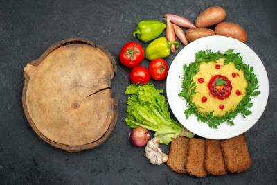 Top View of Mashed Potato Dish with Dark Bread and Vegetables – Free Download