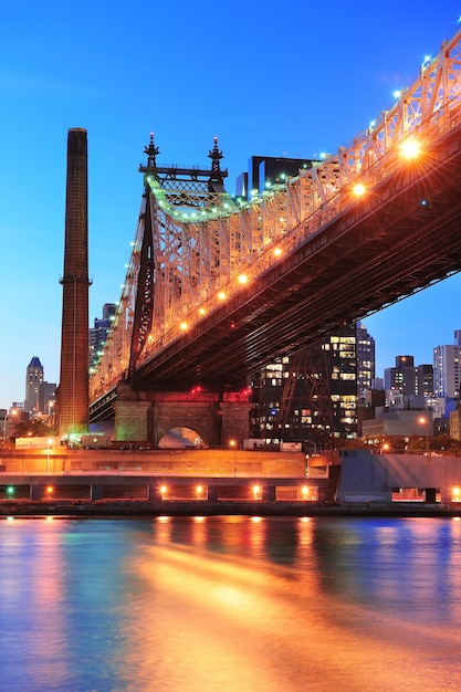 Stunning Sunset Views of the Queensboro Bridge over NYC’s East River – Free Download