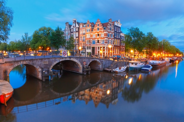 Night City View of Amsterdam Canal and Bridge – Free Download