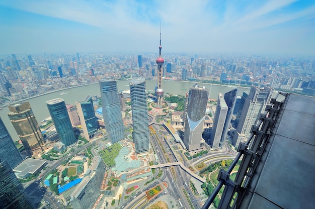 Stunning Aerial View of Shanghai City Featuring the Oriental Pearl Tower – Free Download