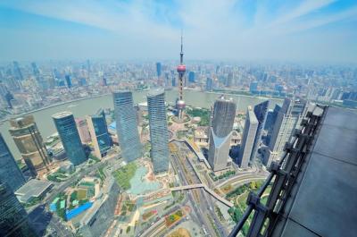 Stunning Aerial View of Shanghai City Featuring the Oriental Pearl Tower – Free Download