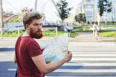 Handsome Man with Big Beard in Red T-Shirt Walking in the City – Free Download