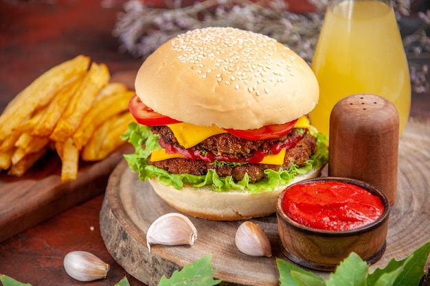 Tasty Meat Burger with French Fries on Dark Background – Free Download