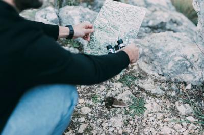 Hiker Examining a Map: Free Stock Photo for Download