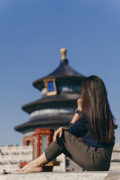 Brunette Girl Sitting on Steps by Temple of Heaven in China – Free Download