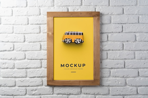 Frame Mockup Hanging on Brick Wall – Free Download