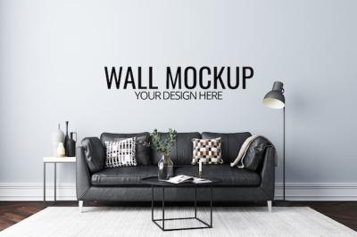 Wall Mockup in White Interior Featuring Sofa and Decoration – Free Download