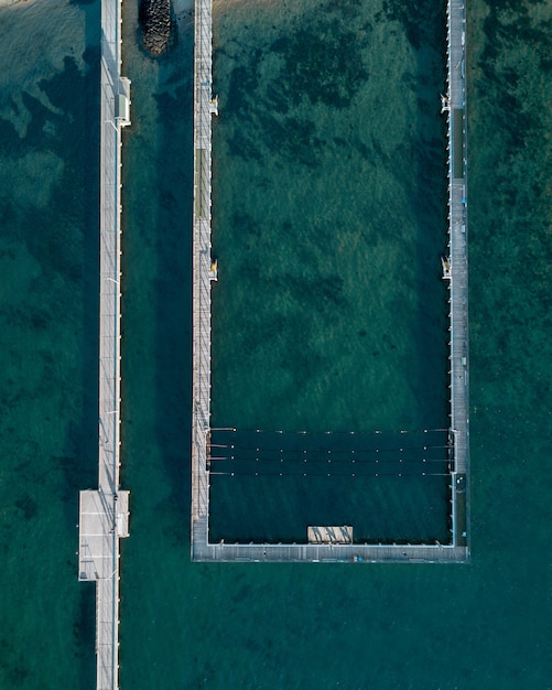 Aerial Shot of the Sea and Sea Pool at the Coast – Free Stock Photo | Download for Free