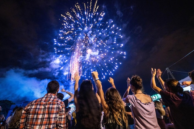 Crowd of People Watching Fireworks at Night – Free Download