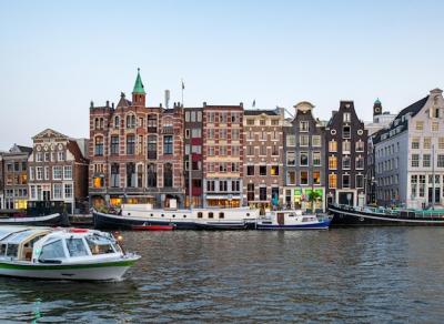 Amsterdam Canals: Charming Bridges and Dutch Houses – Free Download