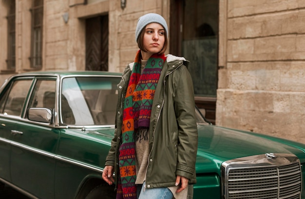 Young Woman Next to Green Car – Free Stock Photo Download